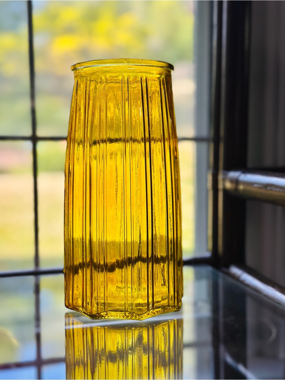 Vintage yellow, sun shaped, ribbed glass vase